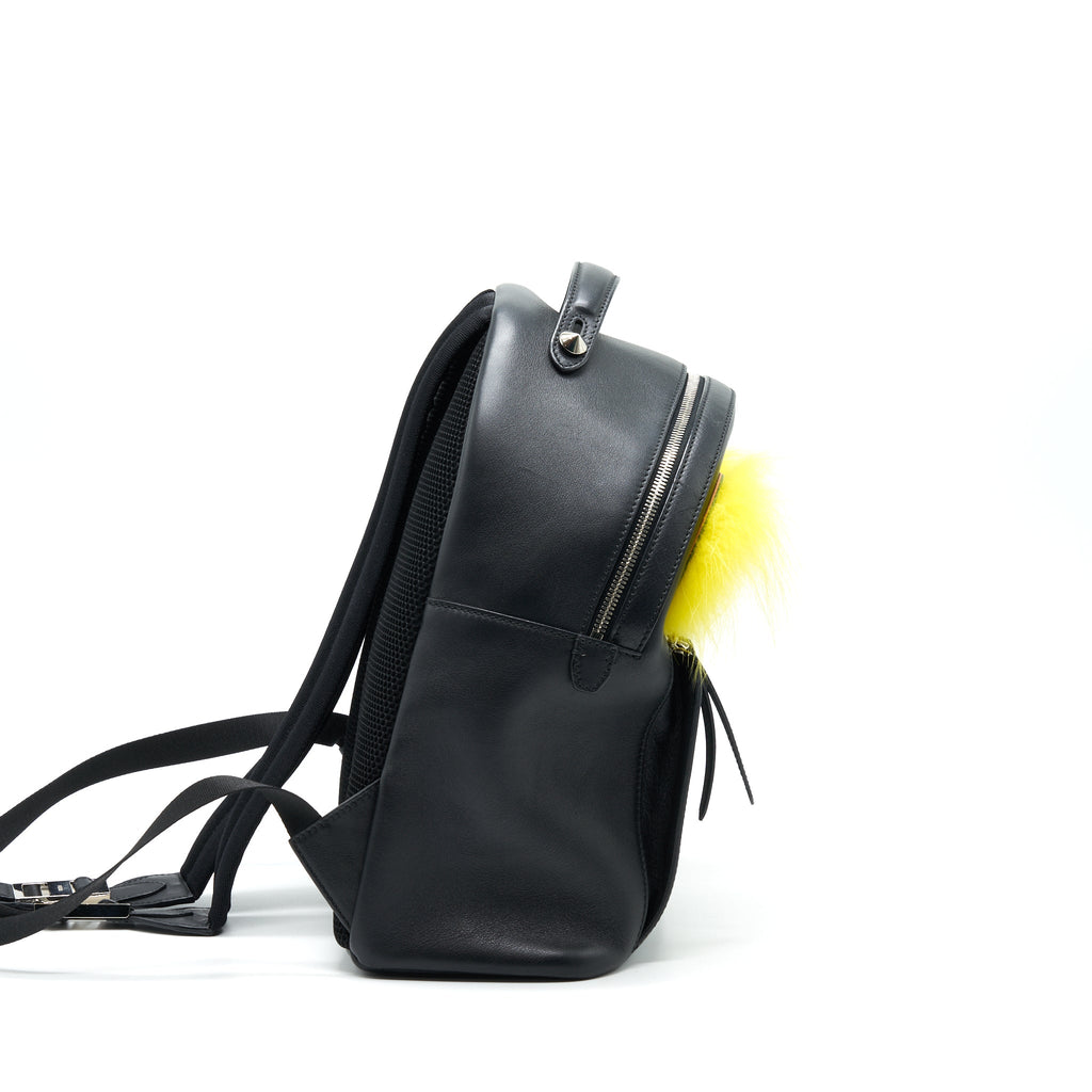 fendi-monster-backpack-in-black-with-yellow-fur