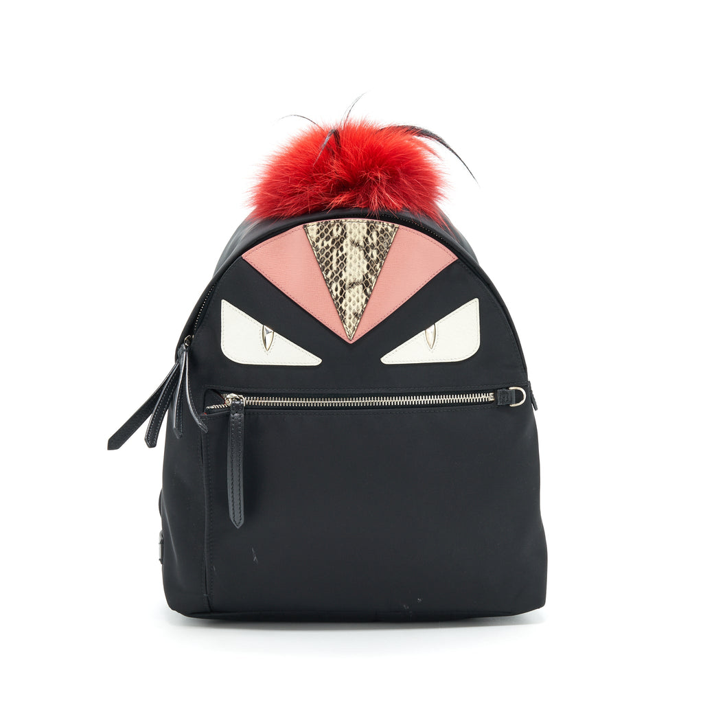 fendi-monster-backpack-in-black-with-red-fur