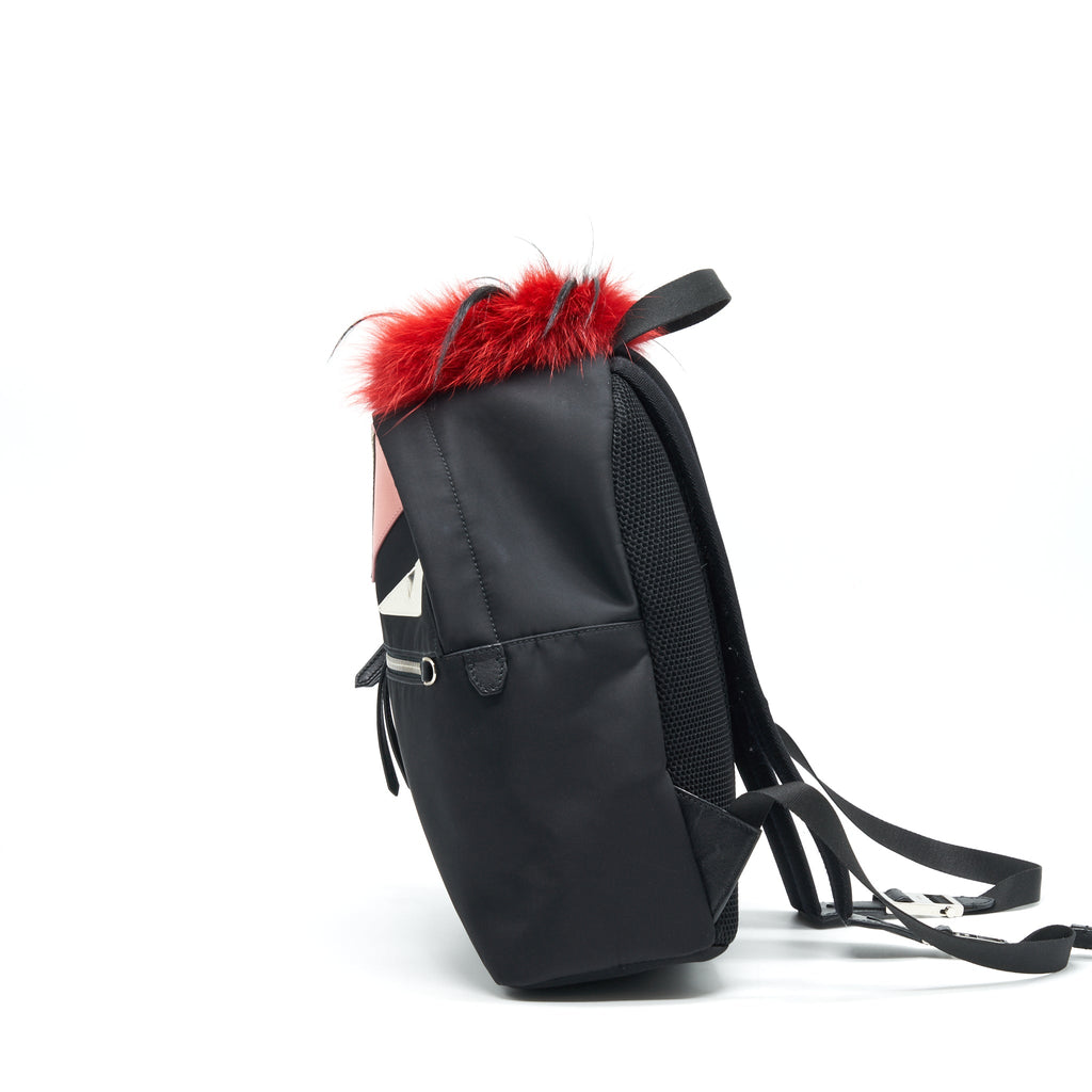 fendi-monster-backpack-in-black-with-red-fur