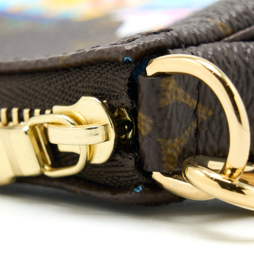 louis-vuitton-vivienne-holidays-mini-pochette-accessories-monogram-canvas-multicolor-ghw