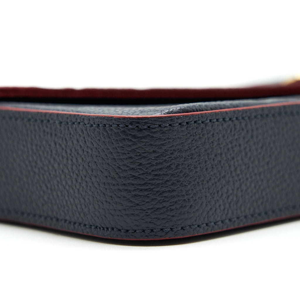 louis-vuitton-felicie-pochette-monogram-empreinte-leather-marine-rouge