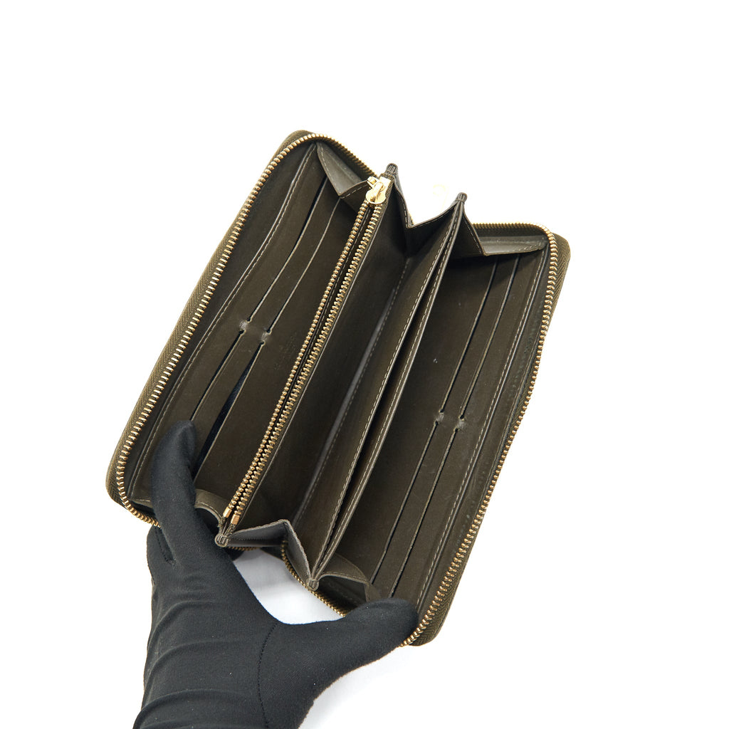 louis-vuitton-zippy-wallet-in-patent-leather-brown