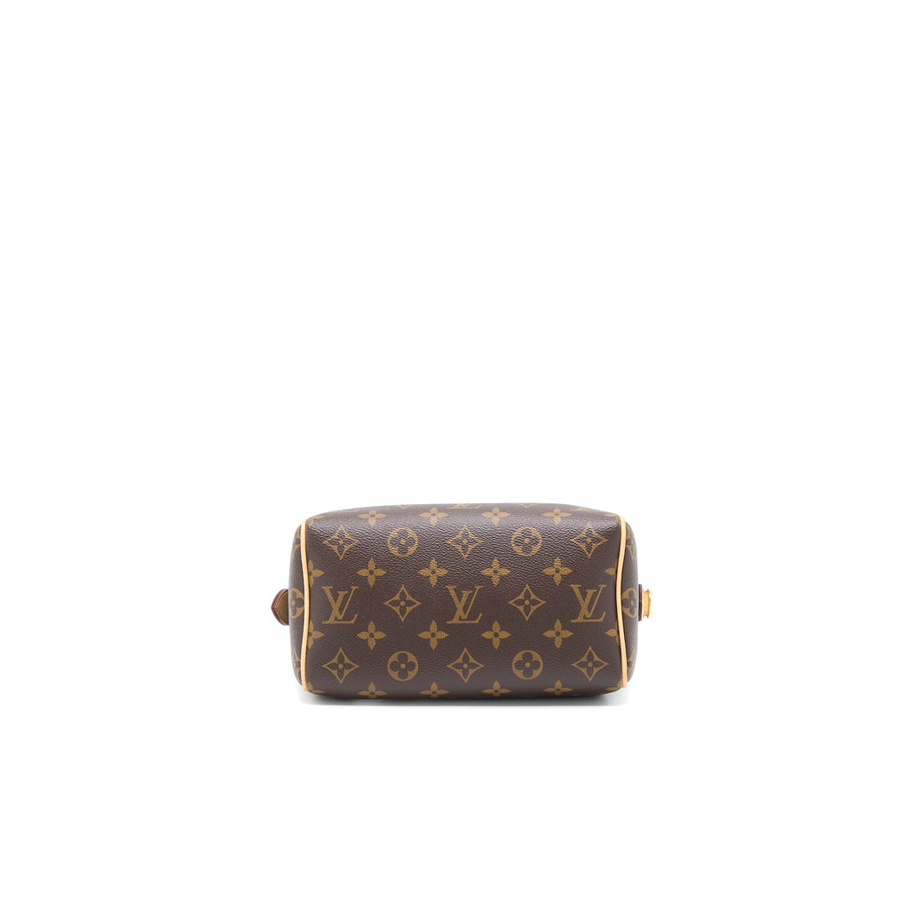 louis-vuitton-speedy-bandouliere-20-monogram-canvas-with-fuchsia-strap-1