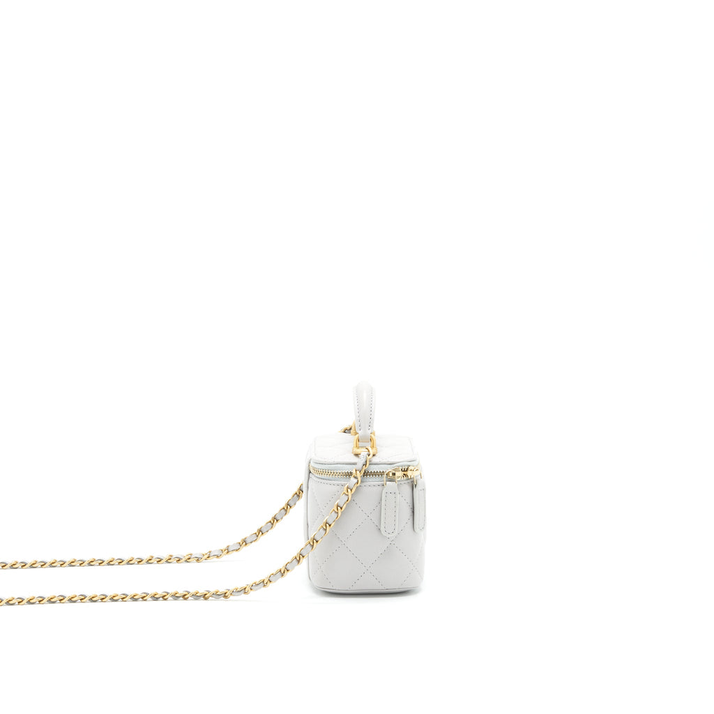 chanel-21a-small-handle-vanity-with-chain-grey-with-ghw