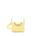 hermes-mini-lindy-clemence-z1-jaune-poussin-ghw