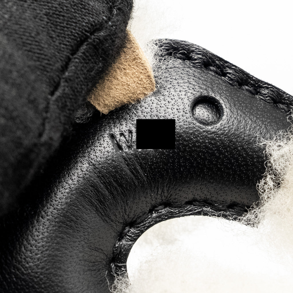 hermes-budy-charm-shearing-leather-black